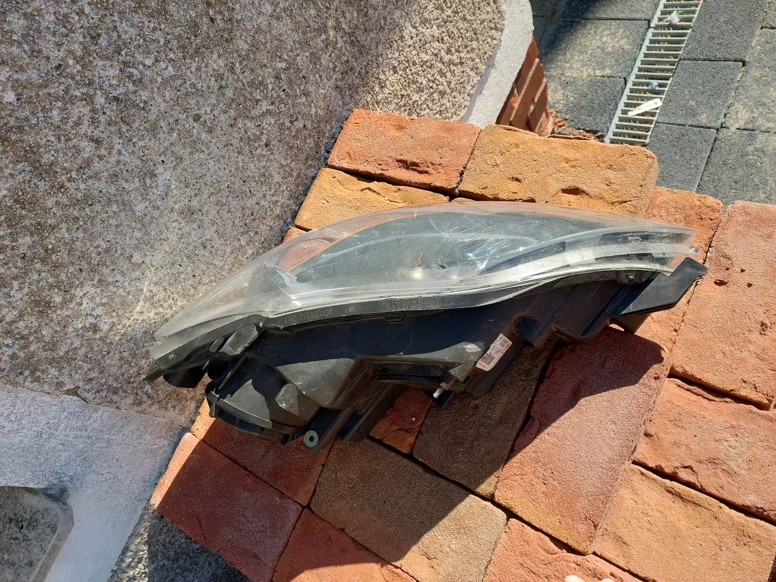 Golf plus left headlight